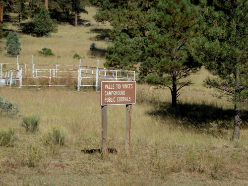 GDMBR: The sign says 'Valle Tio Vinces, Campground, [and] Public Corrals'.